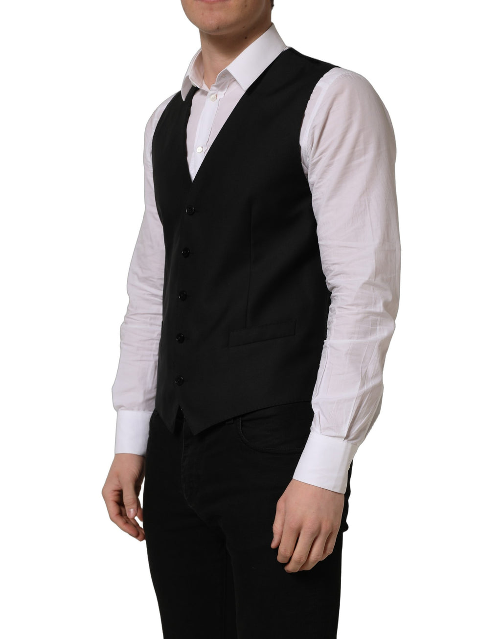 Gilet en laine noir Dolce & Gabbana à boutonnière simple, veston élégant pour homme, porté sur un fond neutre.