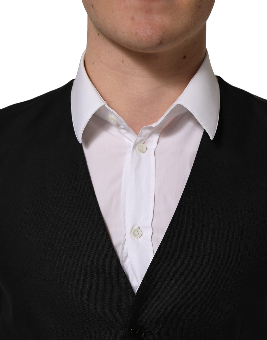 Gilet en laine noir Dolce & Gabbana à simple boutonnage, veste cintrée élégante pour homme.