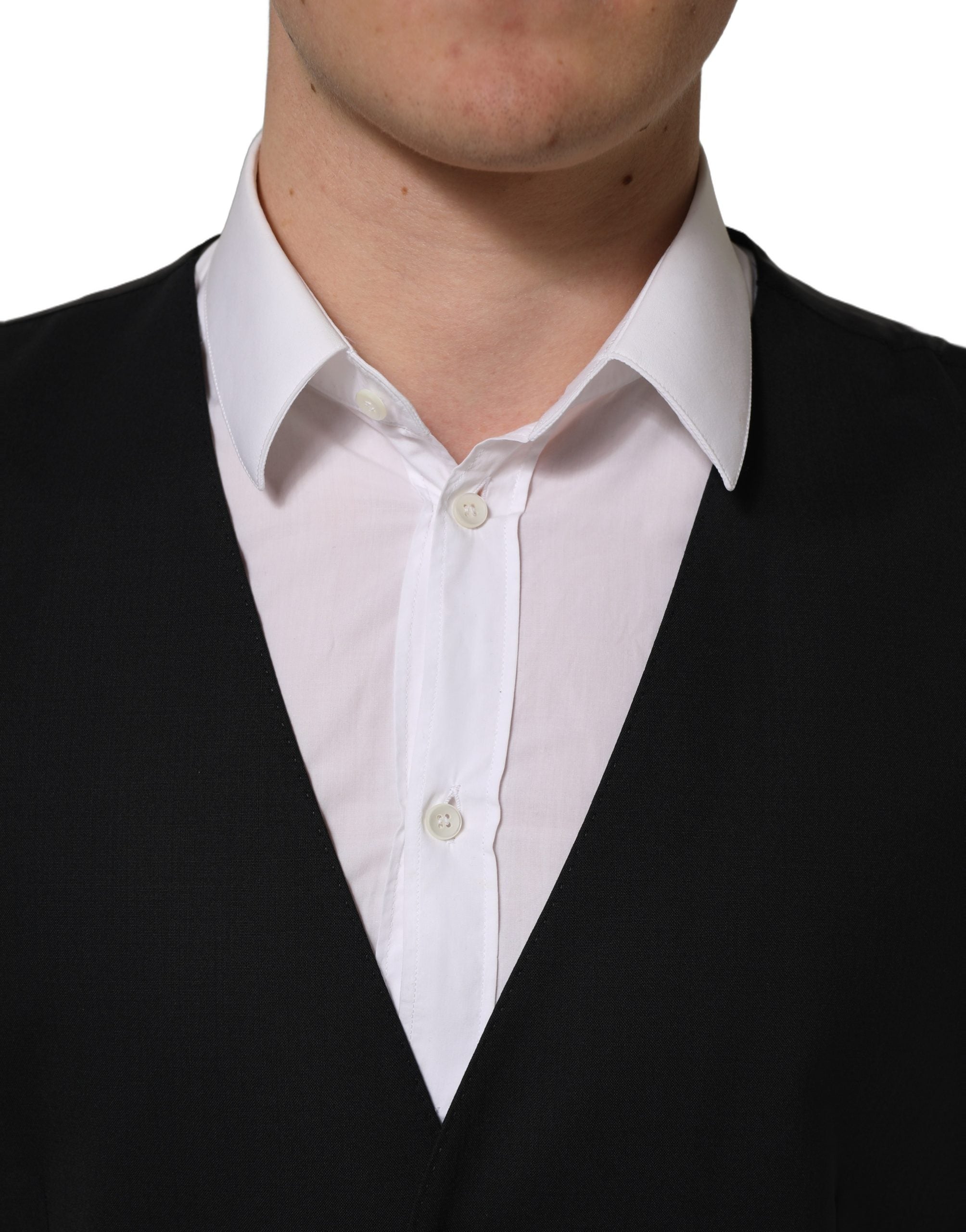 Gilet croisé en laine noire Dolce & Gabbana, veste sans manches élégante pour homme, détails de couture précis et finition raffinée.