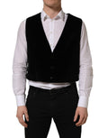 Gilet noir en coton Dolce & Gabbana, croisé simple avec boutons, porté sur un mannequin.
