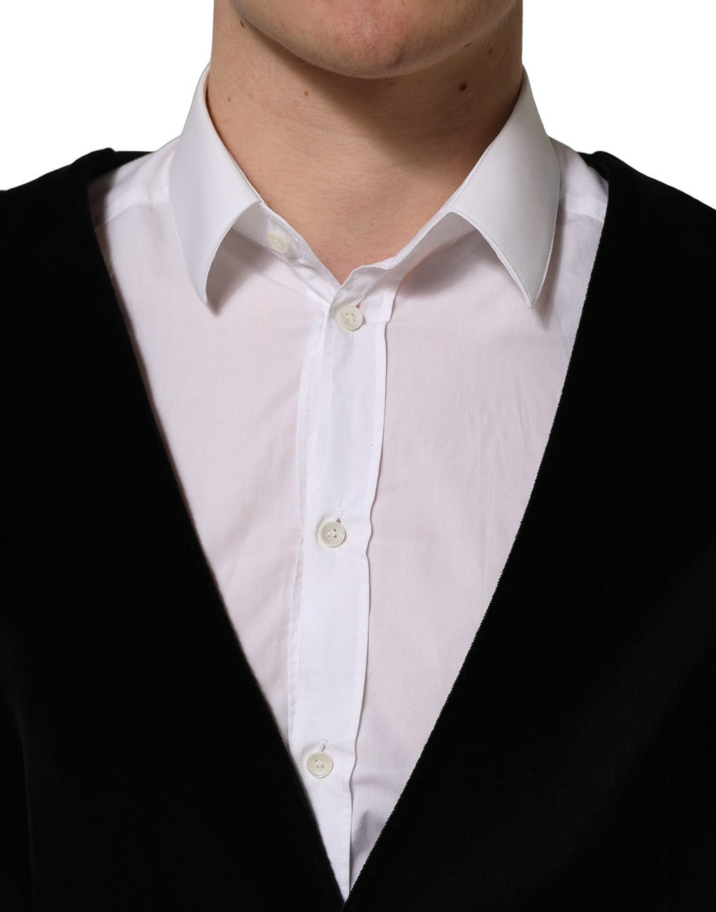 Gilet noir en coton Dolce & Gabbana à boutonnage simple, élégant et ajusté, porté sur un mannequin.