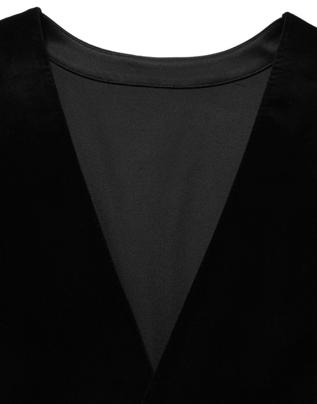 Gilet noir en coton Dolce & Gabbana, à simple boutonnage, porté sur un mannequin, détail élégant et chic.