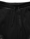 Pantalons cargo joggers Dolce & Gabbana noirs à taille mi-haute, style décontracté avec poches latérales et ceinture ajustable.