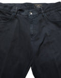 Jeans homme Dolce & Gabbana en coton noir, coupe skinny, taille mi-haute, denim ajusté, visible sur l’image.