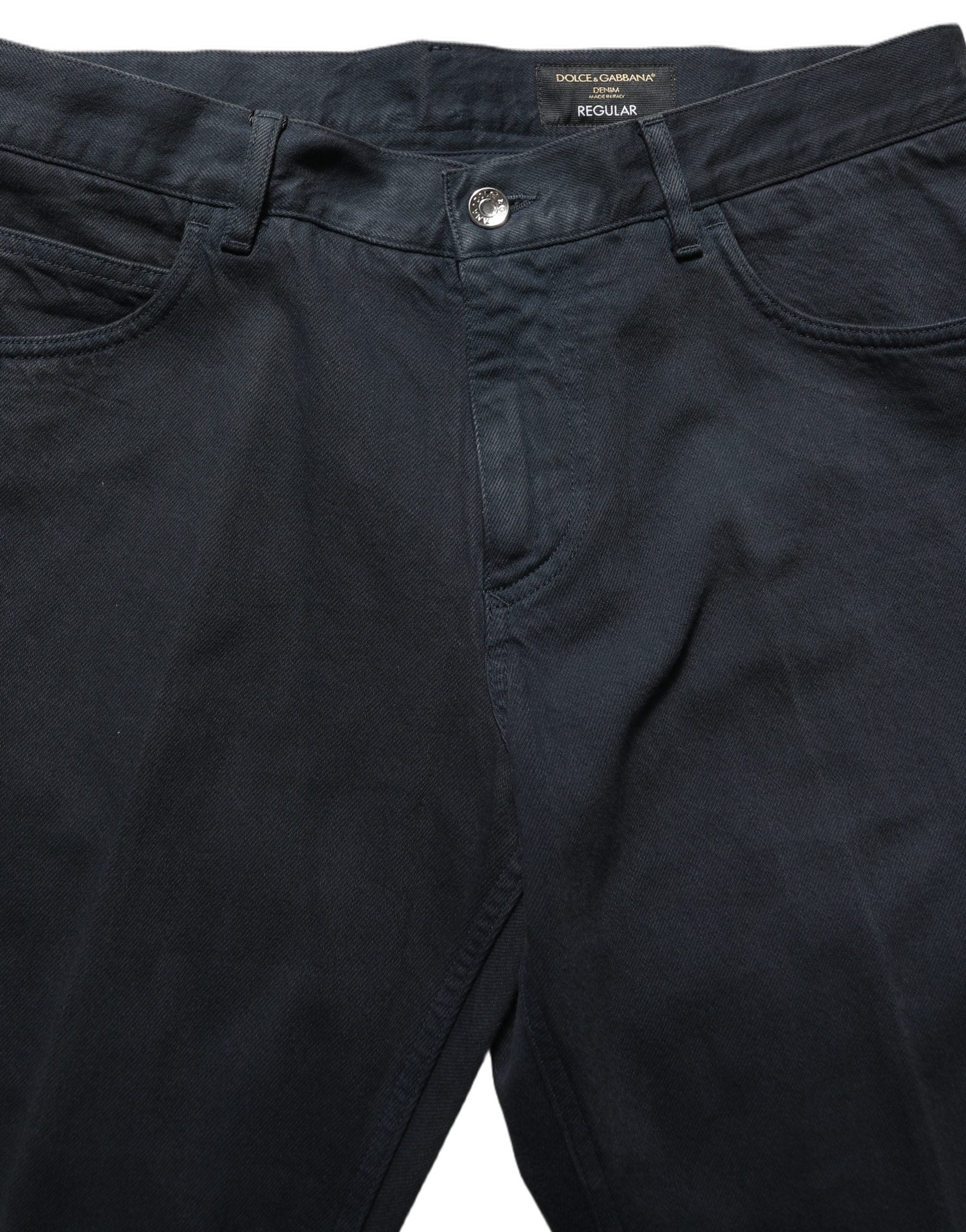 Jeans homme Dolce & Gabbana en coton noir, coupe skinny, taille mi-haute, denim ajusté, visible sur l’image.