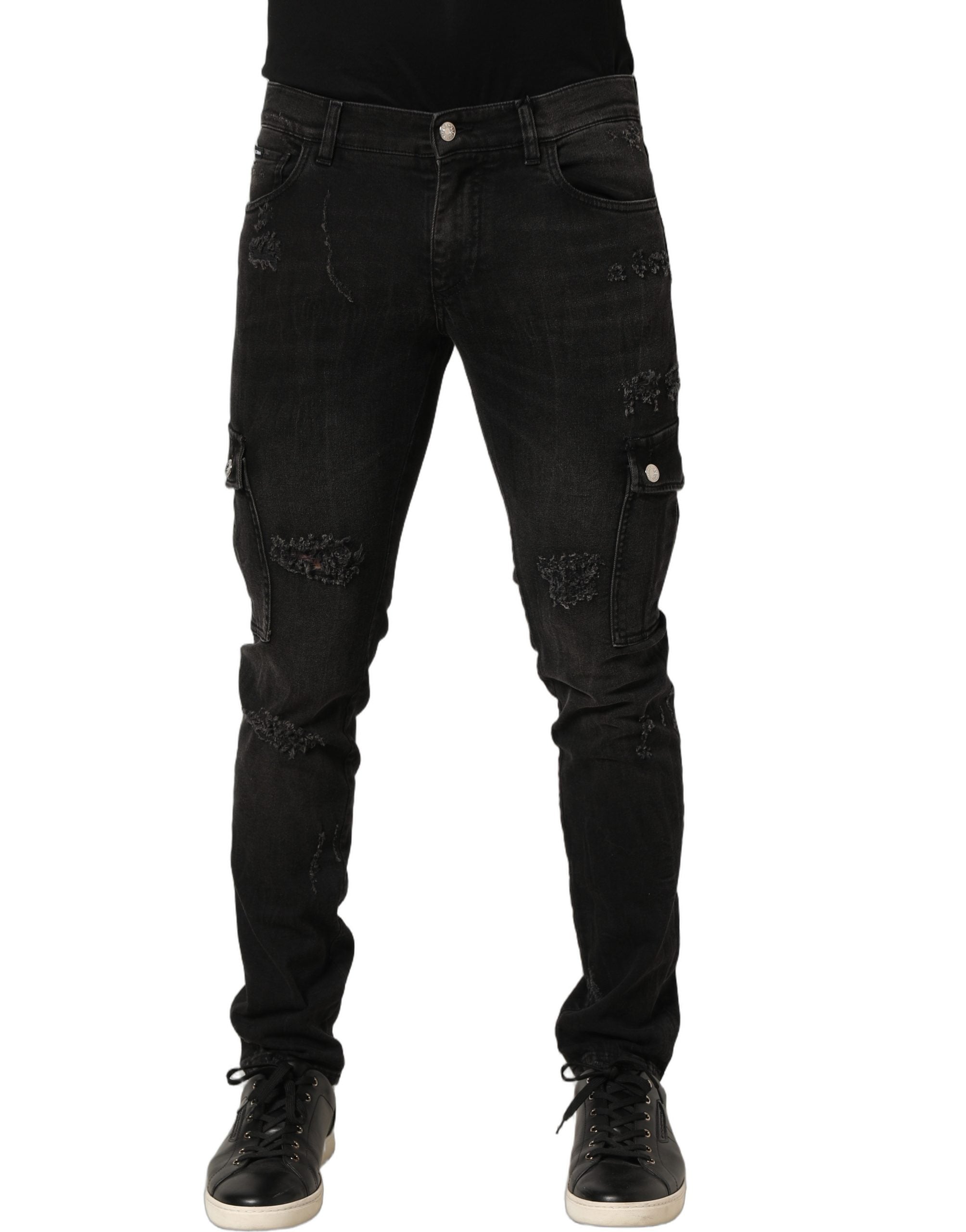 Jeans homme Dolce & Gabbana en coton noir déchiré avec style cargo, denim distressed, visible détails et poches.