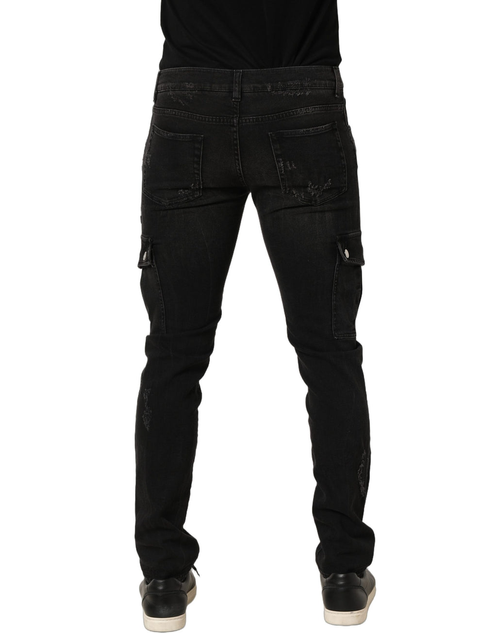 Jeans homme en coton noir déchiré de style cargo de Dolce & Gabbana, denim avec détails usés et poches larges.