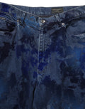 Jeans en denim droit pour homme Dolce & Gabbana, coton bleu tie-dye, style décontracté, visible avec détails de couture.