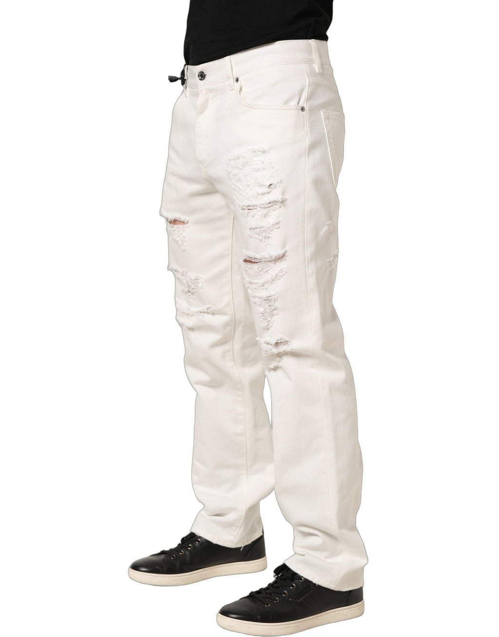Jeans en denim blanc Dolce & Gabbana, coupe droite, effet déchiré, en coton, visibles sur l'image.