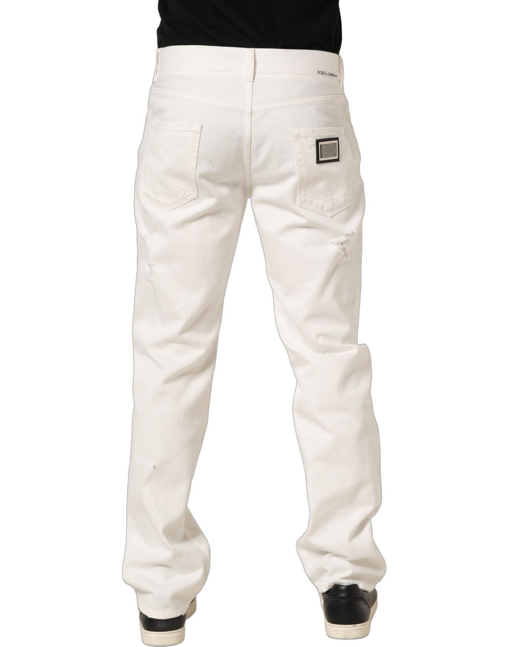 Jeans en denim blanc Dolce & Gabbana, coupe droite décontractée avec effet vieilli, en coton, visible sur l'image.