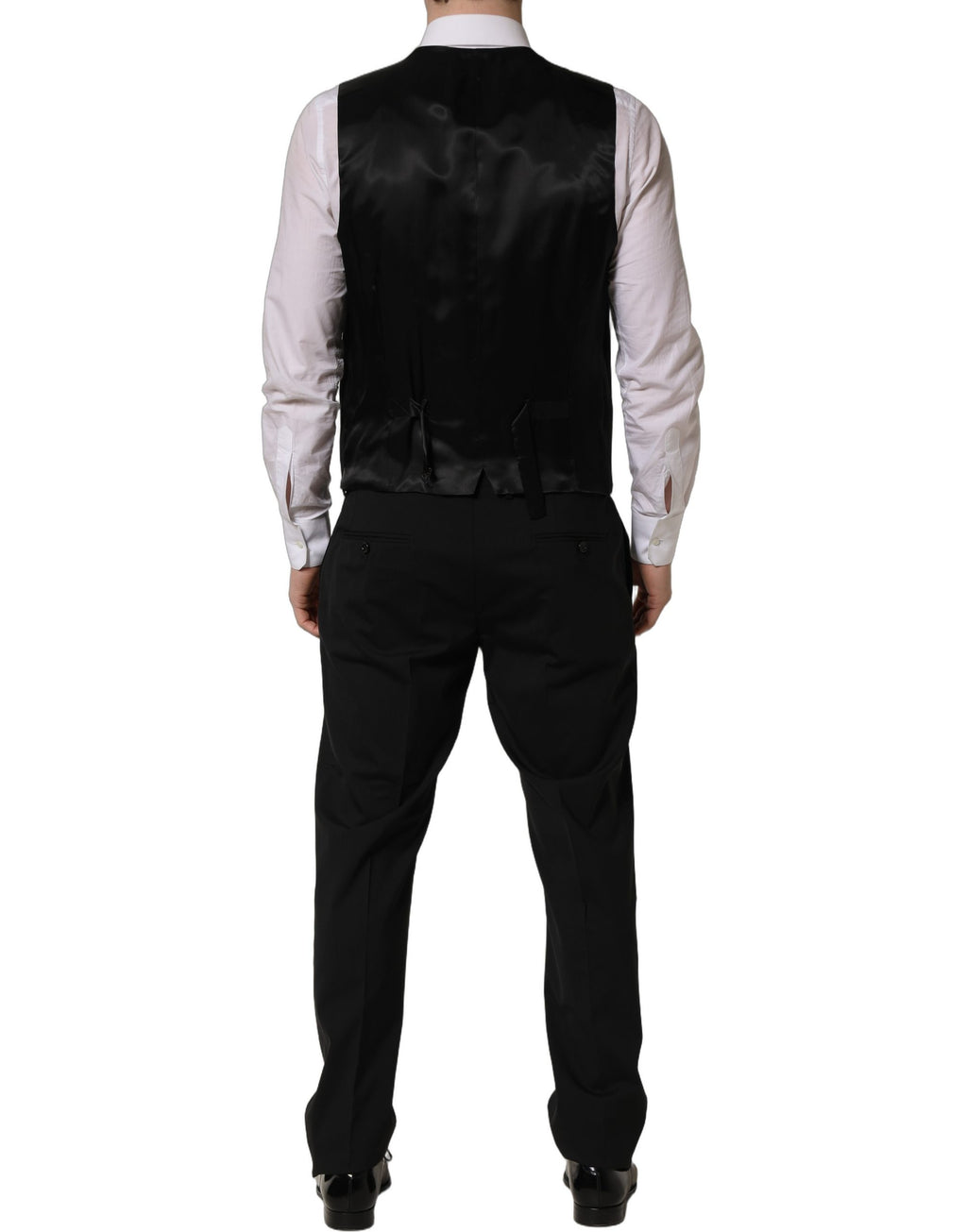 Costume homme noir en laine Dolce & Gabbana, costume trois pièces ajusté pour occasions formelles, élégant et sophistiqué.