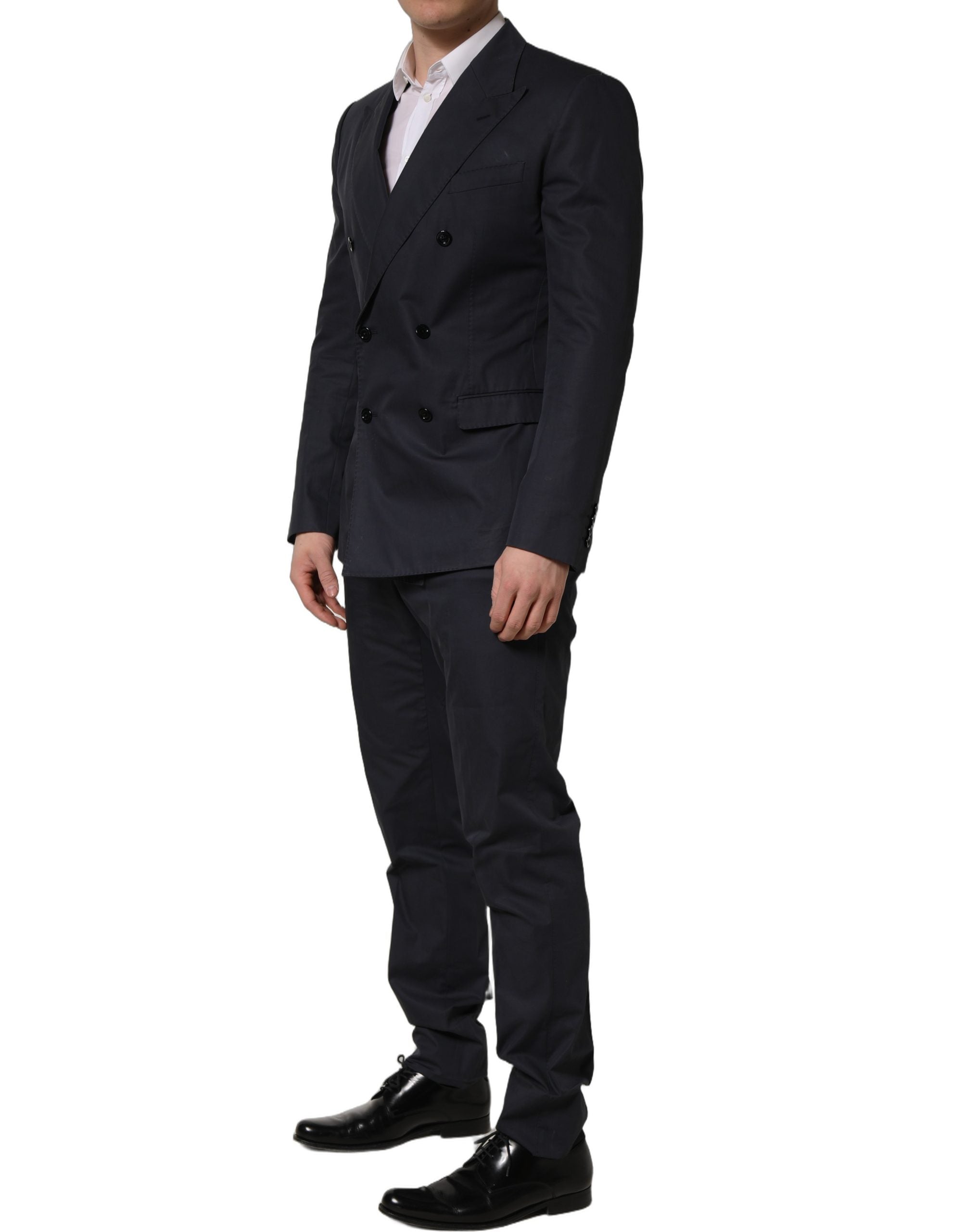 Costume homme Dolce & Gabbana en coton bleu, costume deux pièces ajusté pour occasion formelle, vue de face.