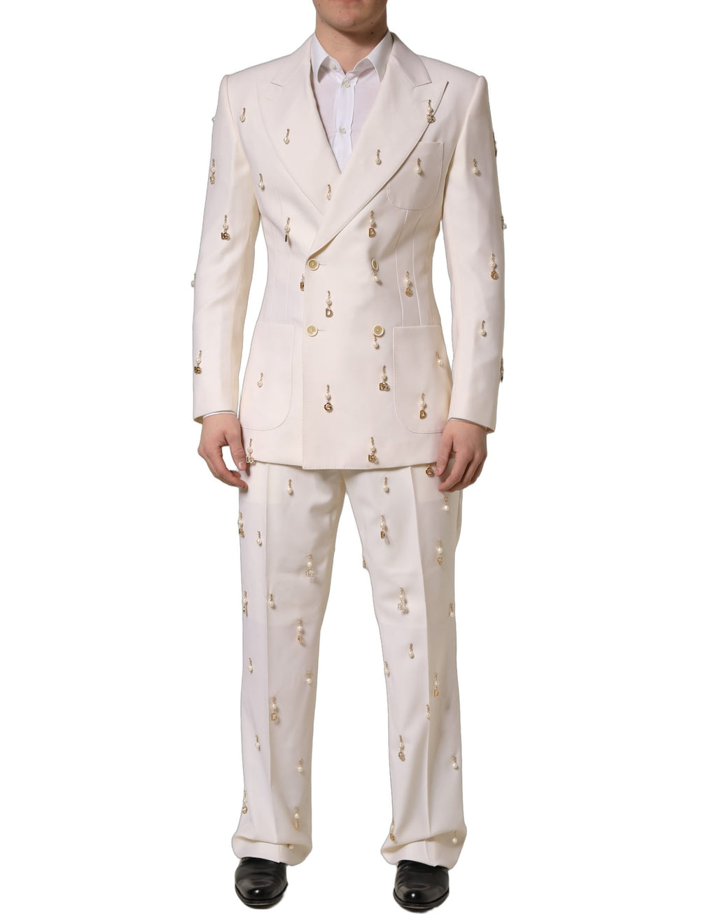 Costume homme Dolce & Gabbana en laine blanche, costume deux pièces ajusté pour occasions formelles, détail visible de la veste et du pantalon.