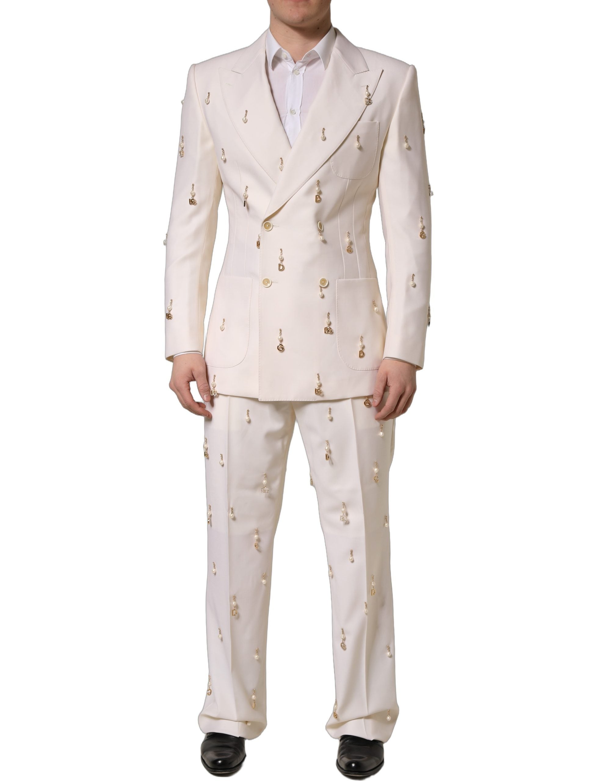 Costume homme Dolce & Gabbana en laine blanche, costume deux pièces ajusté pour occasions formelles, détail visible de la veste et du pantalon.