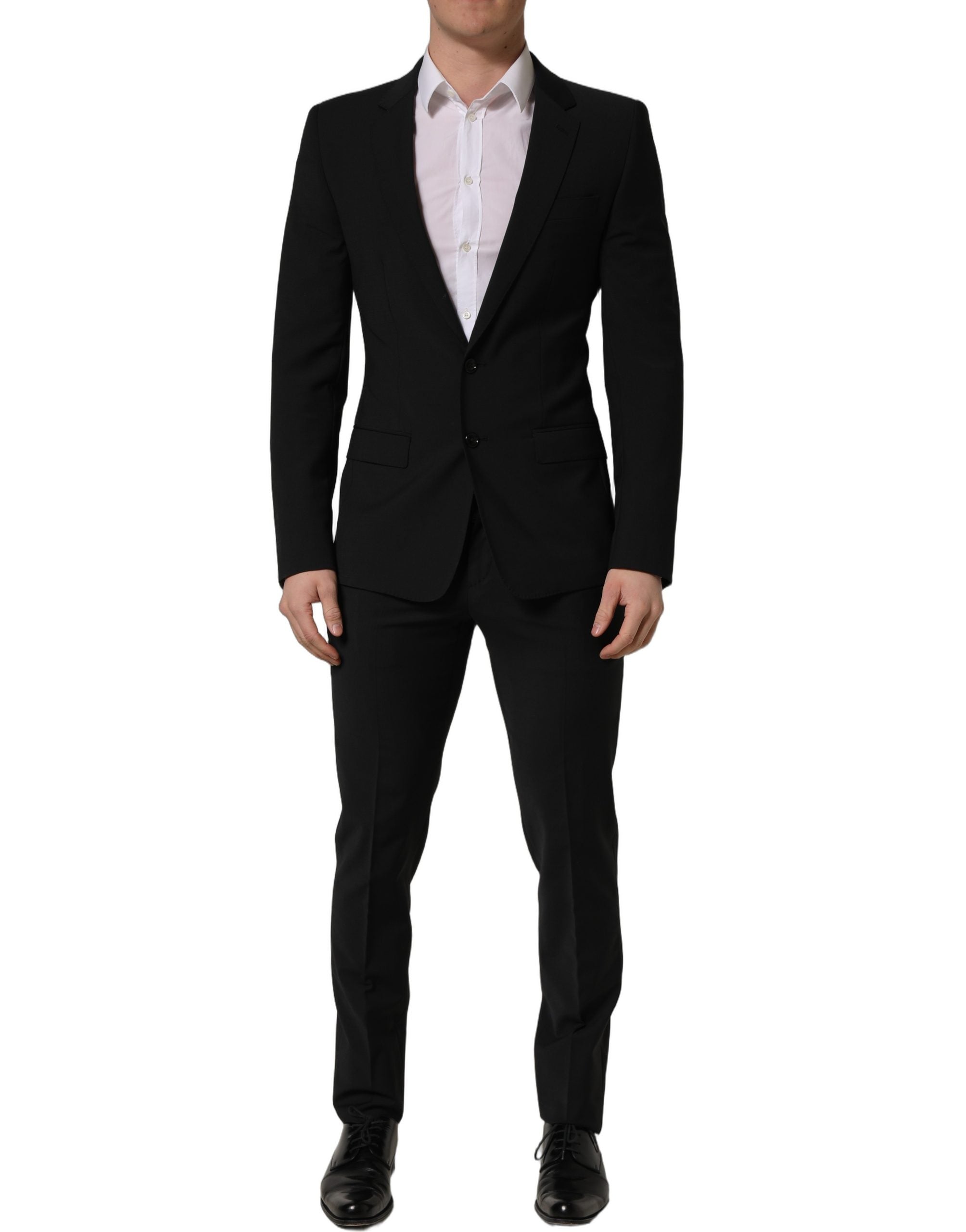 Costume homme Dolce & Gabbana en laine noire, tailleur slim fit à deux pièces pour occasions formelles, vue de face.