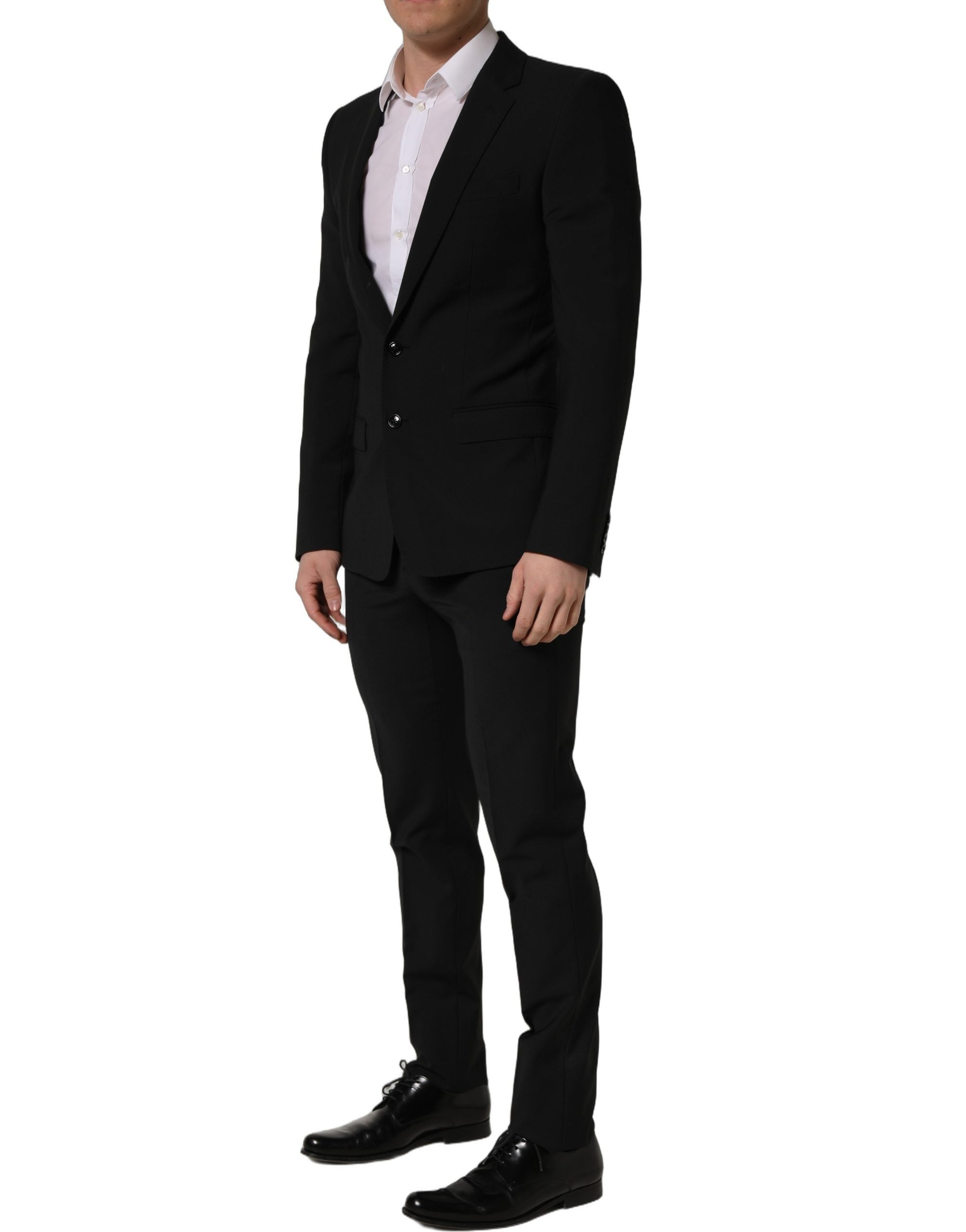 Costume homme noir en laine Dolce & Gabbana, costume deux pièces ajusté pour occasions formelles.