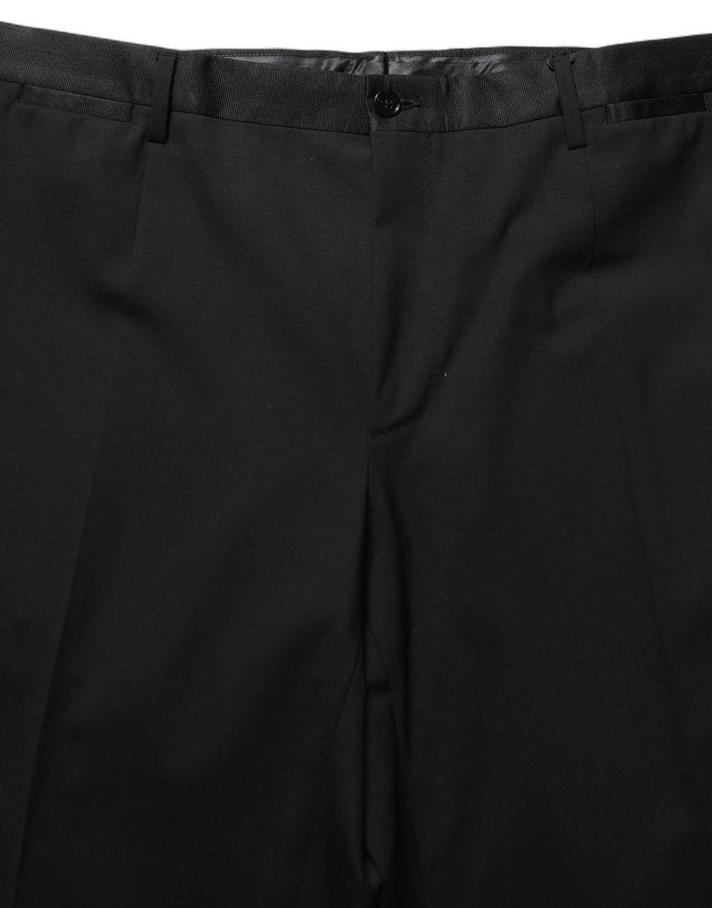 Pantalon noir en laine Dolce & Gabbana, pantalon droit tapered, style élégant et sophistiqué, vue de face sur fond blanc.