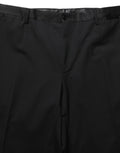 Pantalon noir en laine Dolce & Gabbana, pantalon droit tapered, style élégant et sophistiqué, vue de face sur fond blanc.