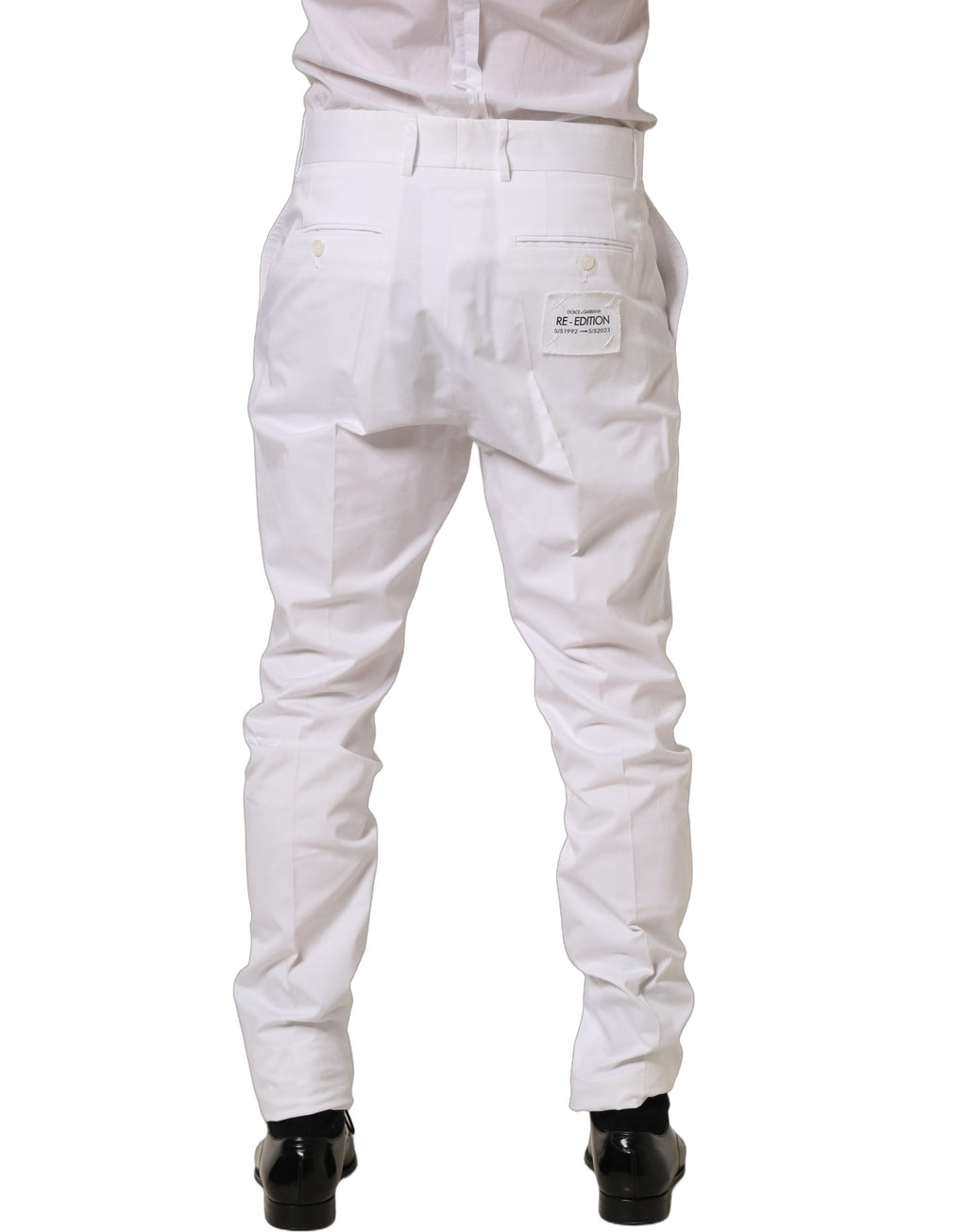 Pantalon blanc en coton Dolce & Gabbana, pantalon droit à coupe tapered, style élégant et confortable, visible en détail.