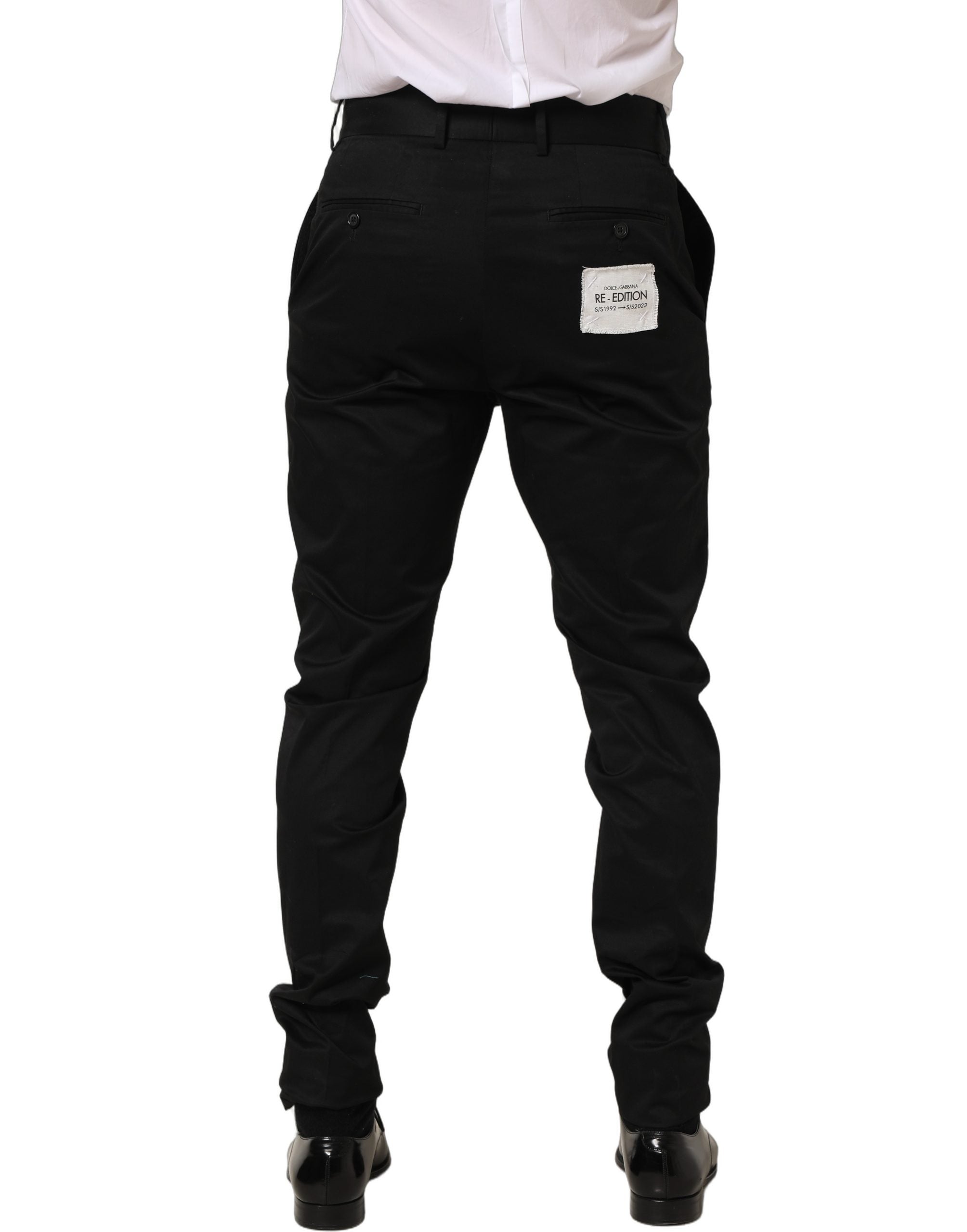 Pantalon noir en coton Dolce & Gabbana, pantalon ajusté à jambe tapered, style élégant pour femme.