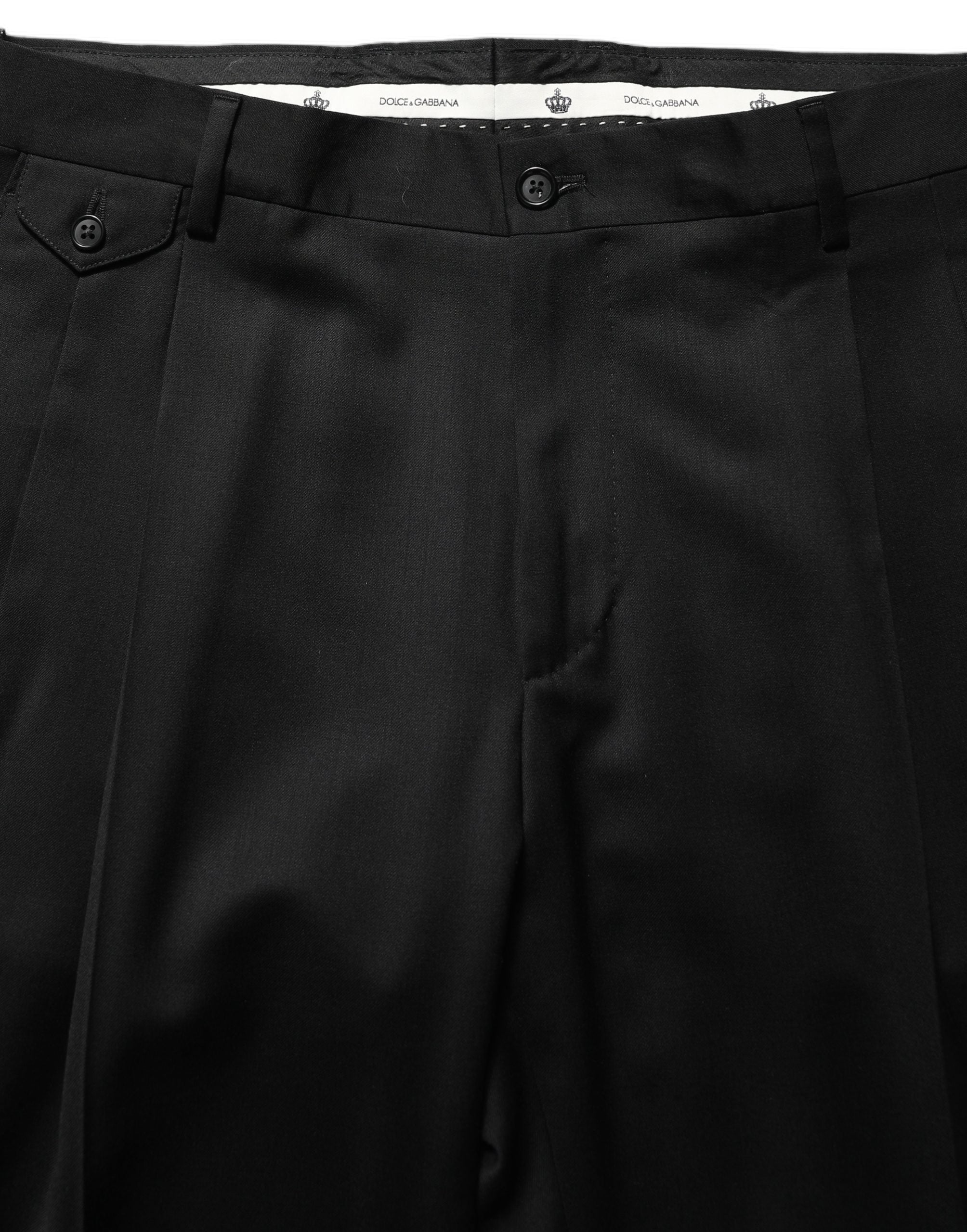 Pantalon homme en laine noire Dolce & Gabbana, coupe tapered, style pantalon de costume élégant et ajusté.