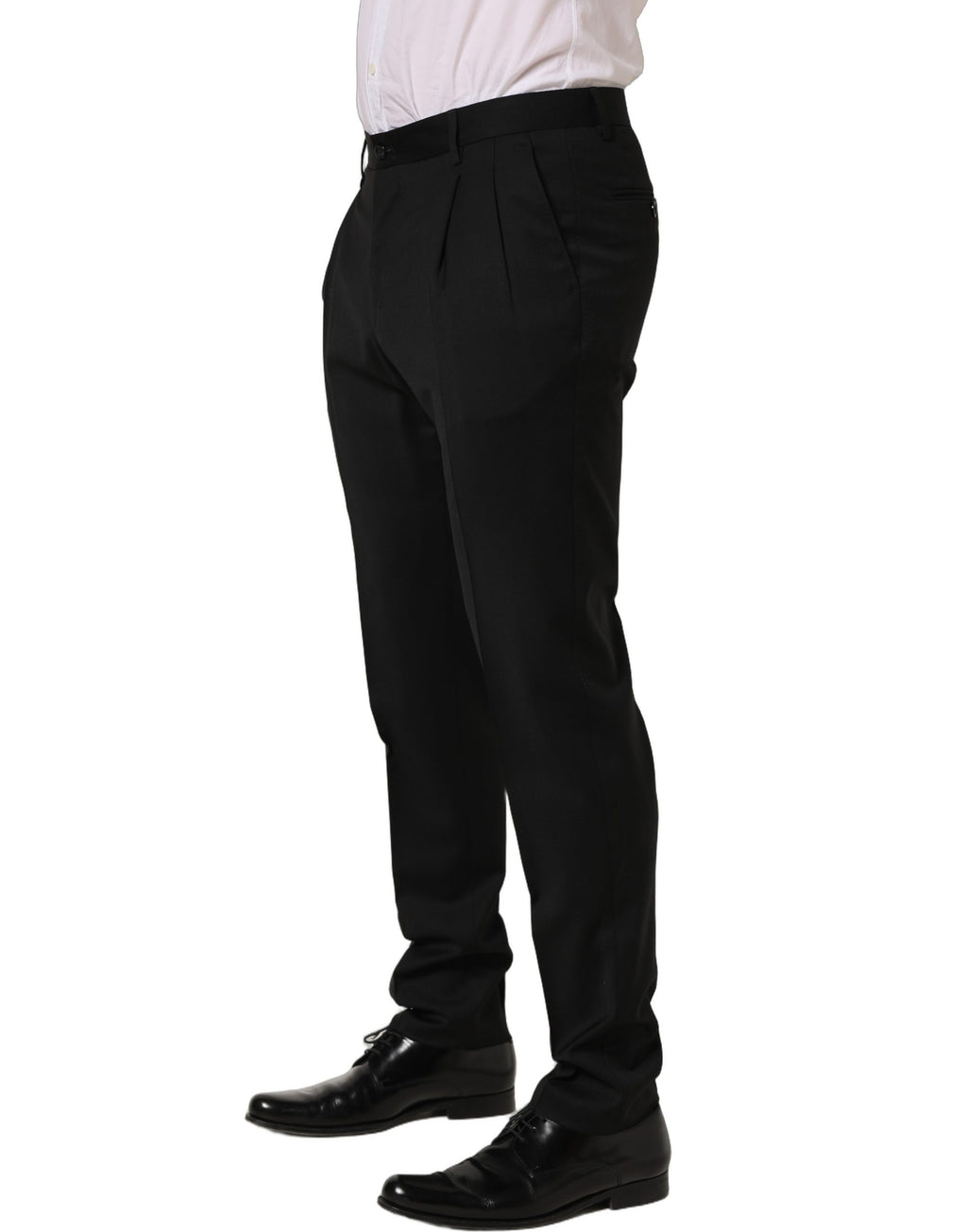 Pantalon homme Dolce & Gabbana en laine noire, coupe tapered, style pantalon de costume élégant avec poches avant.