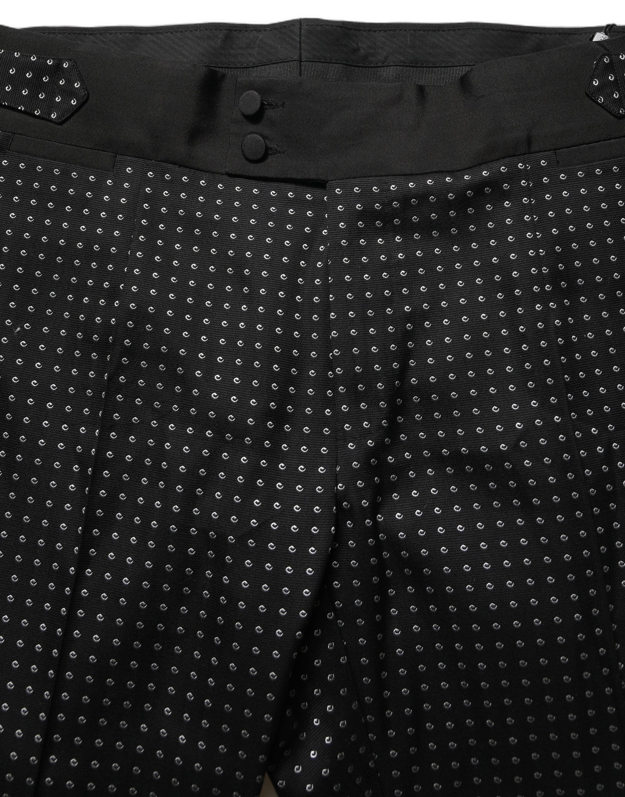 Pantalon en coton noir à pois Dolce & Gabbana, robe pantalon élégante avec motif à pois, vue de devant.