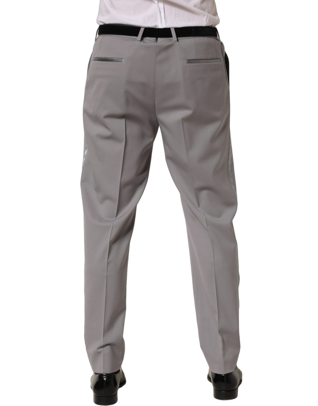 Pantalon homme à coupe tapered en laine grise de Dolce & Gabbana, style élégant et moderne.