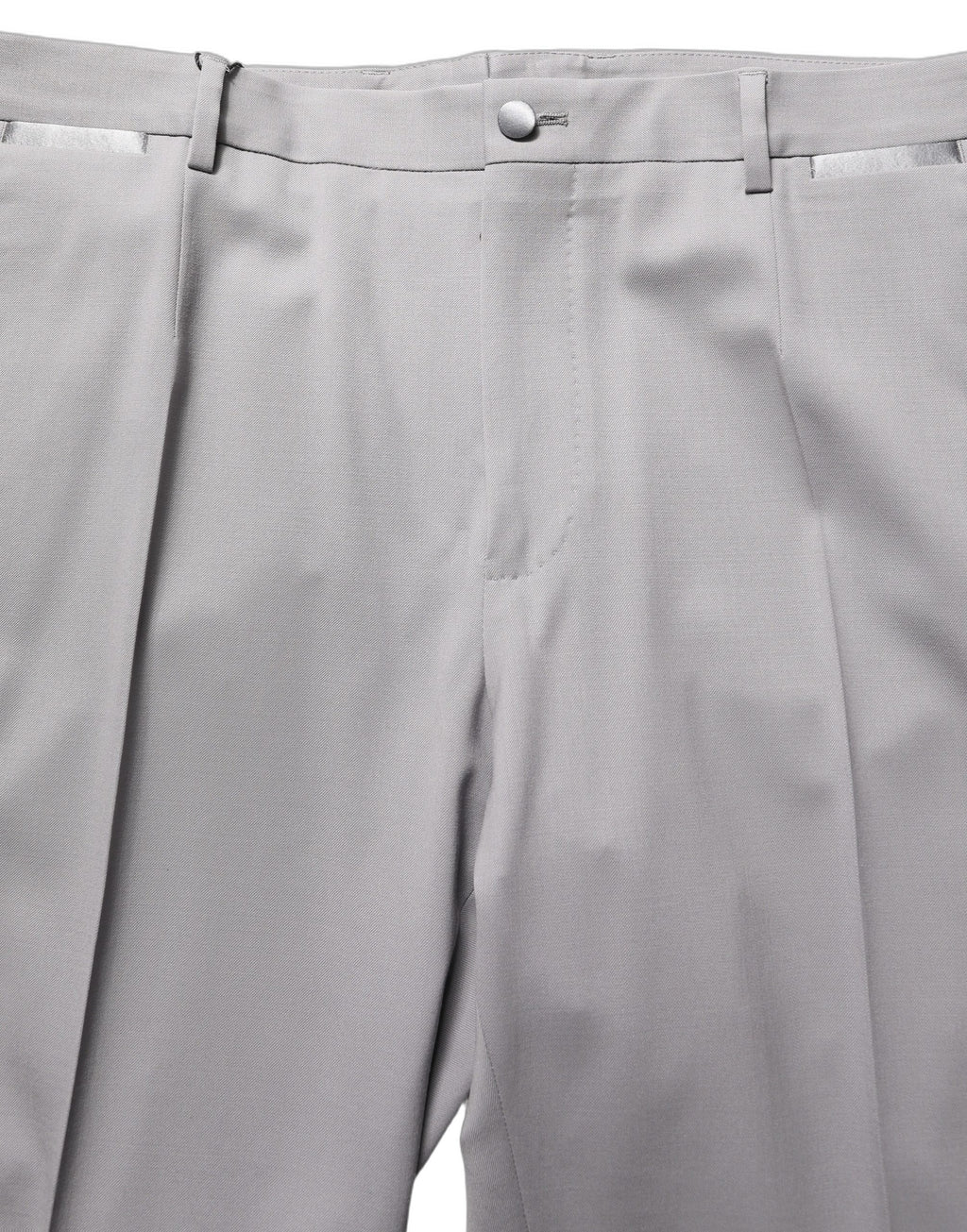 Pantalon homme Dolce & Gabbana en laine gris à coupe tapered, style élégant pour dressing formel.