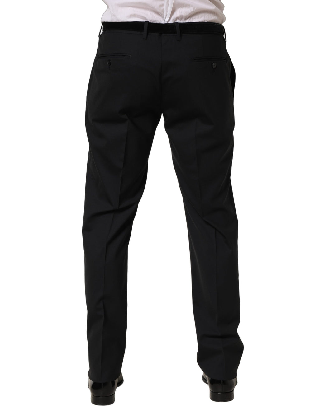 Pantalon habillé en laine noire à coupe tapered, de la marque Dolce & Gabbana, avec une finition élégante et moderne.