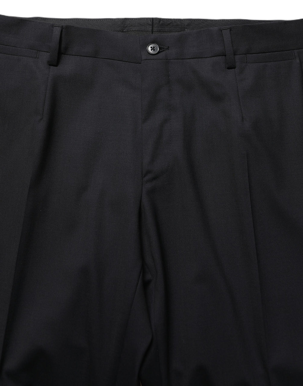 Pantalon noir en laine Dolce & Gabbana, pantalon tapered à jambe ajustée et élégante, pour un style sophistiqué.