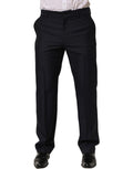 Pantalon de costume noir en laine Dolce & Gabbana, coupe tapered, style élégant et moderne, visible en détail sur l'image.