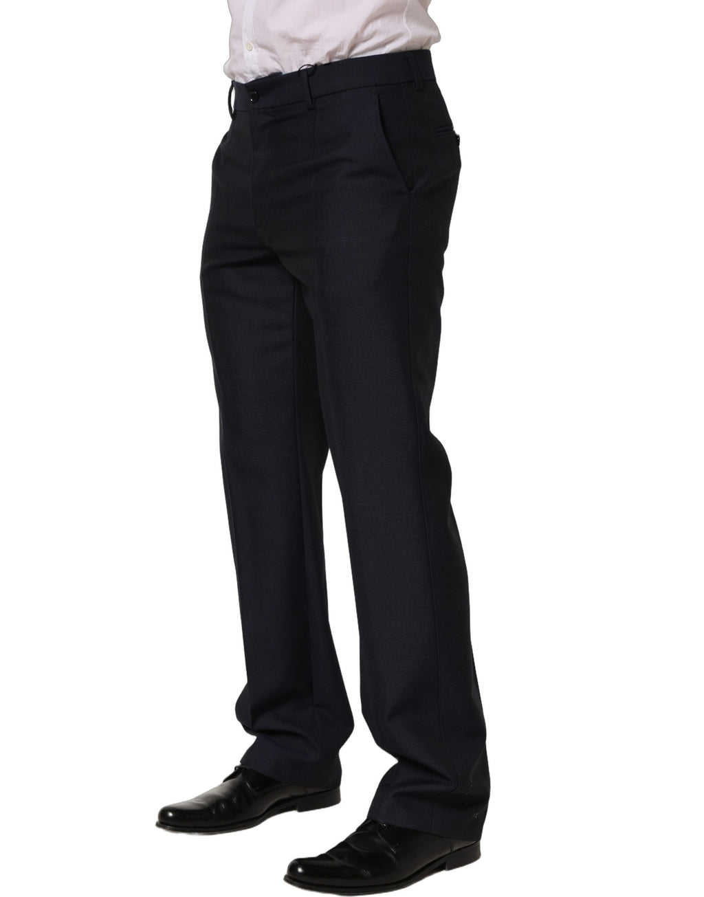 Pantalon habillé en laine noire Dolce & Gabbana avec coupe tapered, style élégant et moderne, visible en gros plan.