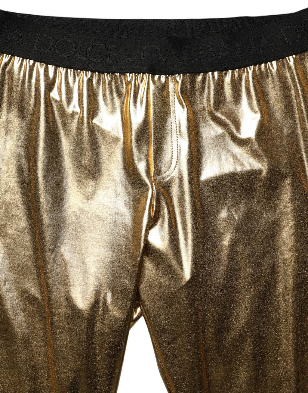 Pantalons skinny en polyester doré métallique de Dolce & Gabbana, coupe ajustée et style élégant, visibles en gros plan.