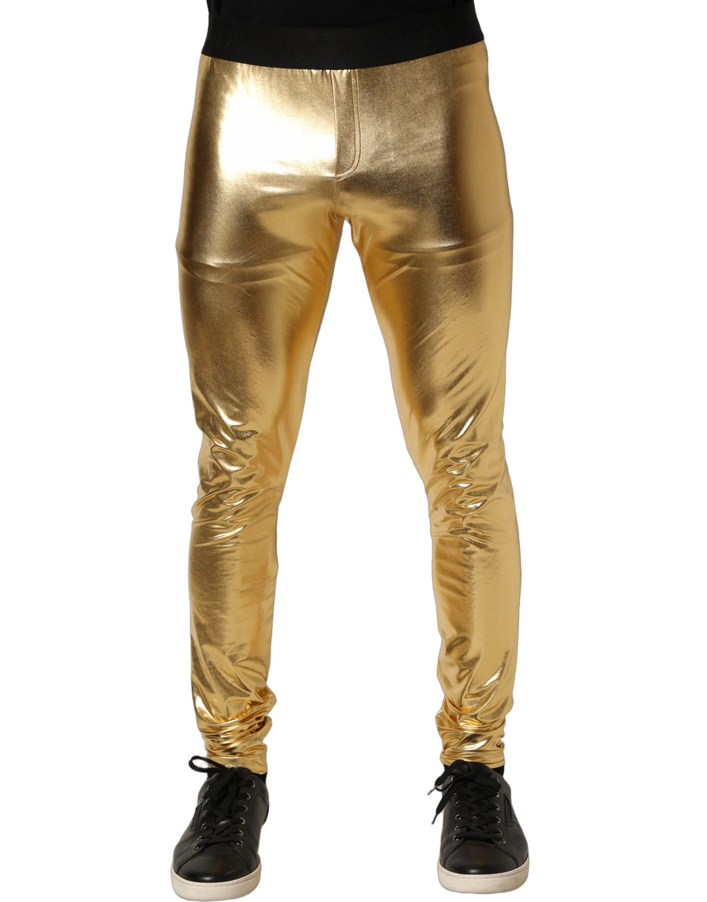 Pantalons skinny en polyester doré métallique de Dolce & Gabbana, style élégant et moderne, visibles sur l'image.