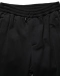 Pantalon cargo jogger Dolce & Gabbana noir à taille mi-haute avec poches, style décontracté et moderne.