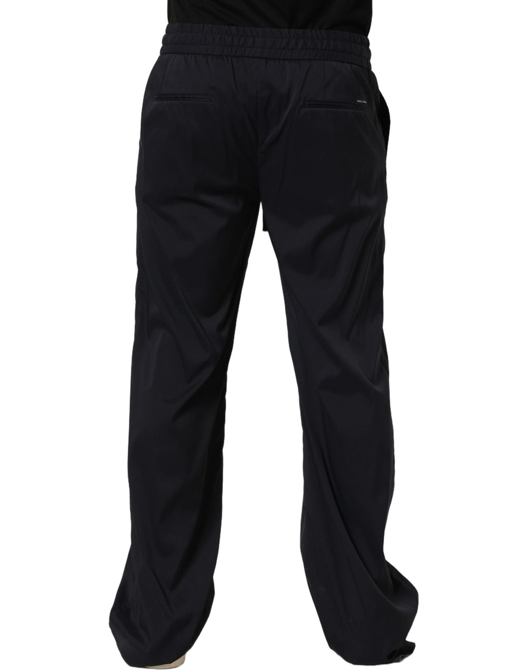 Pantalon de jogging noir en nylon Dolce & Gabbana, coupe droite, style décontracté et confortable, visible en détail dans l'image.