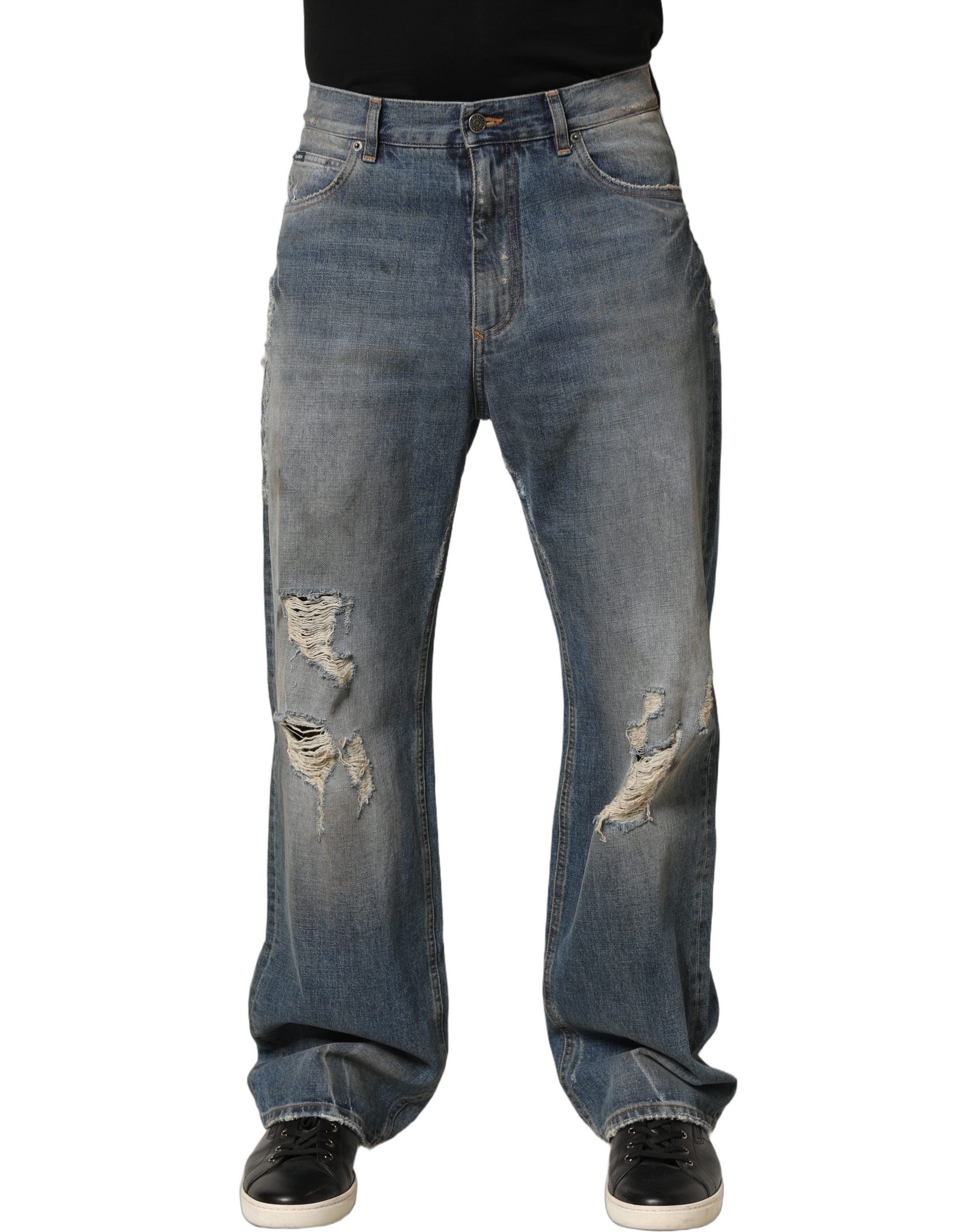 Jeans en denim bleu Dolce & Gabbana, coupe droite, déchirés et délavés, en coton, style décontracté et tendance.