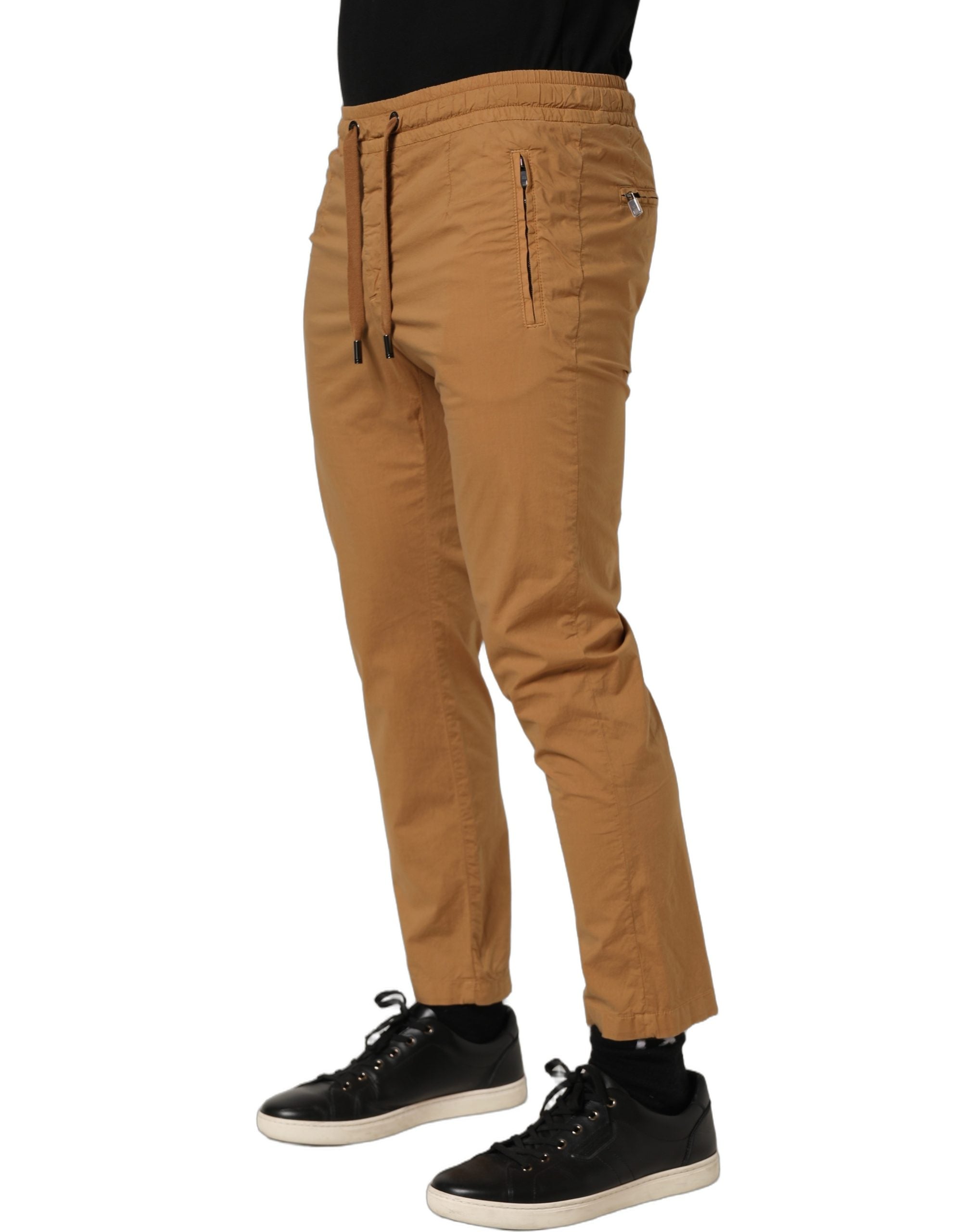 Pantalon jogger Dolce & Gabbana marron, taille moyenne, coupe skinny, en tissu confortable, vue de face.