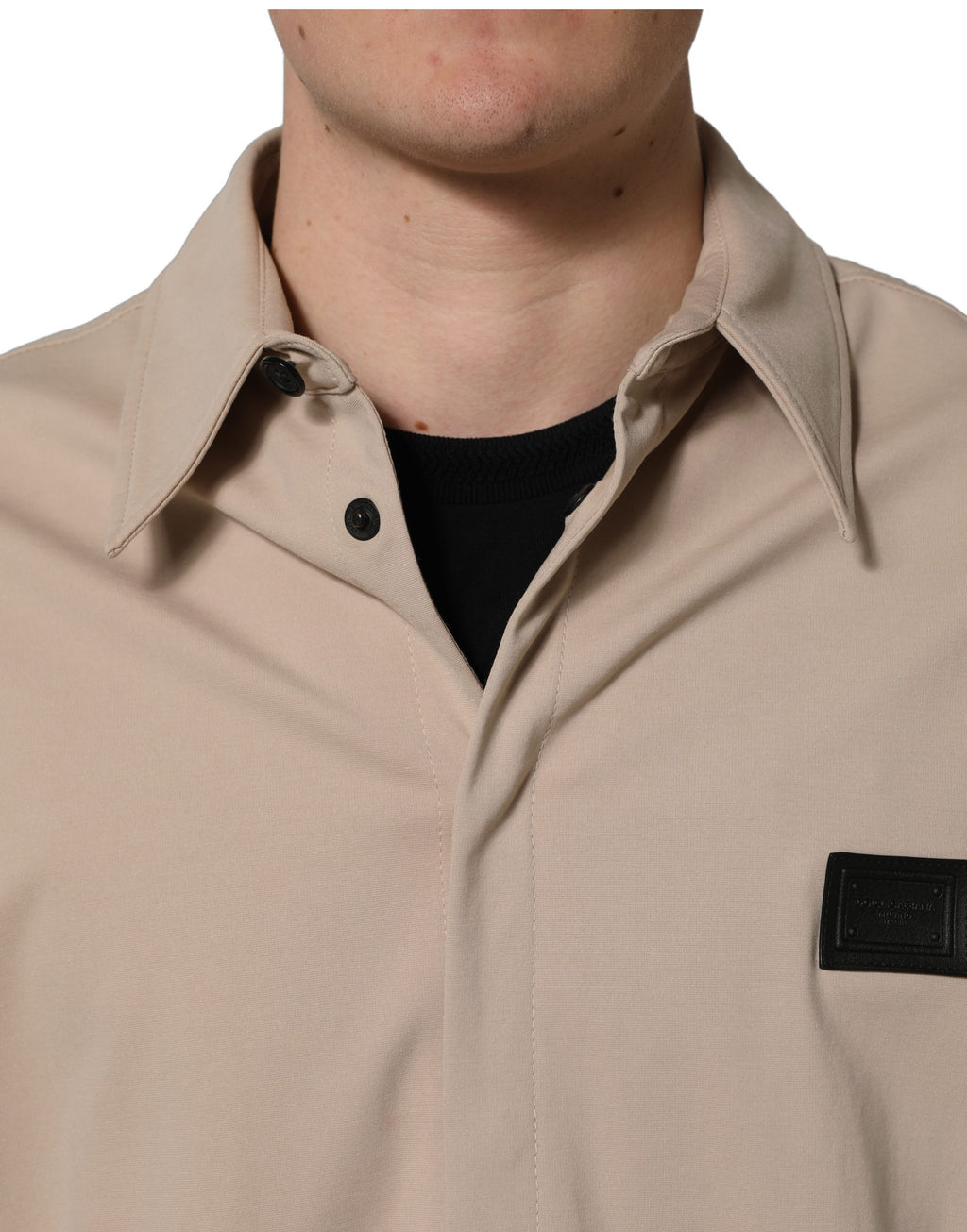 Chemise overshirt beige Dolce & Gabbana en coton pour homme, logo Dolce & Gabbana visible, style décontracté.