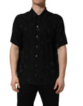 Chemise à manches courtes pour homme Dolce & Gabbana avec logo monogramme noir, design élégant et moderne.