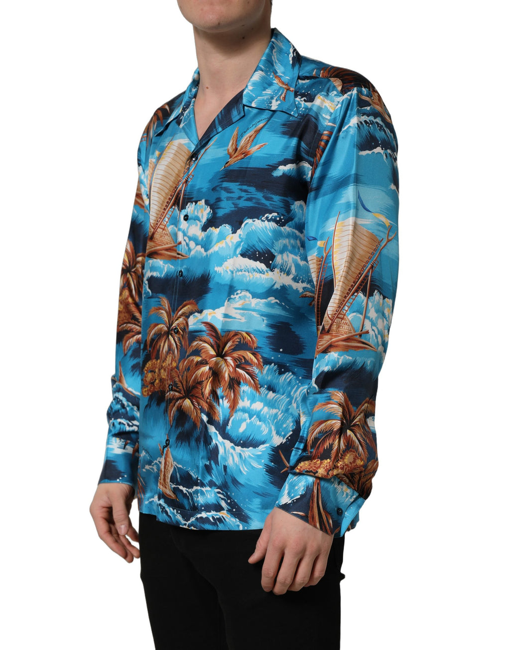 Chemise en soie bleue Dolce & Gabbana avec motif hawaïen et imprimé graphique, look élégant et coloré.