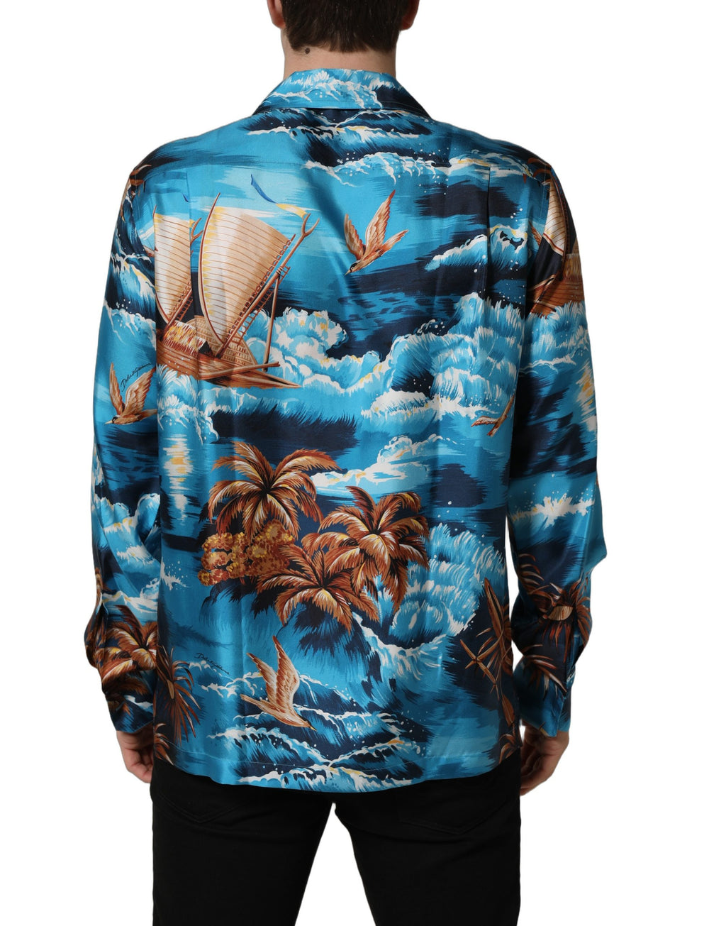 Chemise en soie bleu Dolce & Gabbana à motif hawaïen et imprimé graphique, tissu léger et élégant.