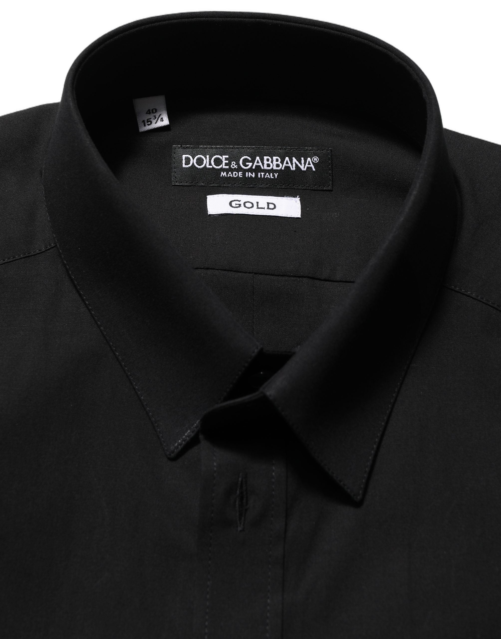 Chemise Dolce & Gabbana en coton stretch noir avec finition or, ajustée et élégante, vue de face.