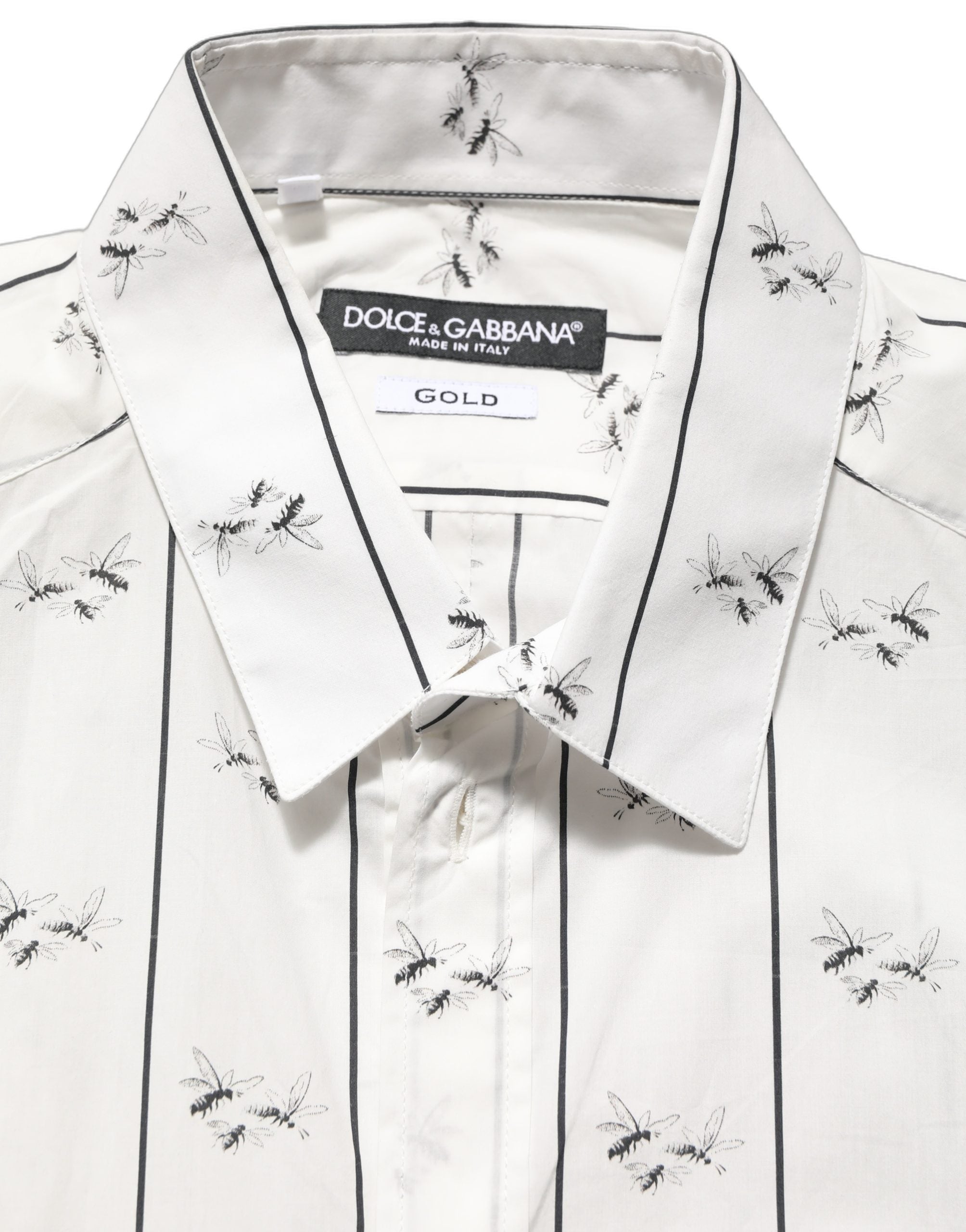 Chemise blanche Dolce & Gabbana avec motif abeilles en coton et détails dorés, élégante et sophistiquée.
