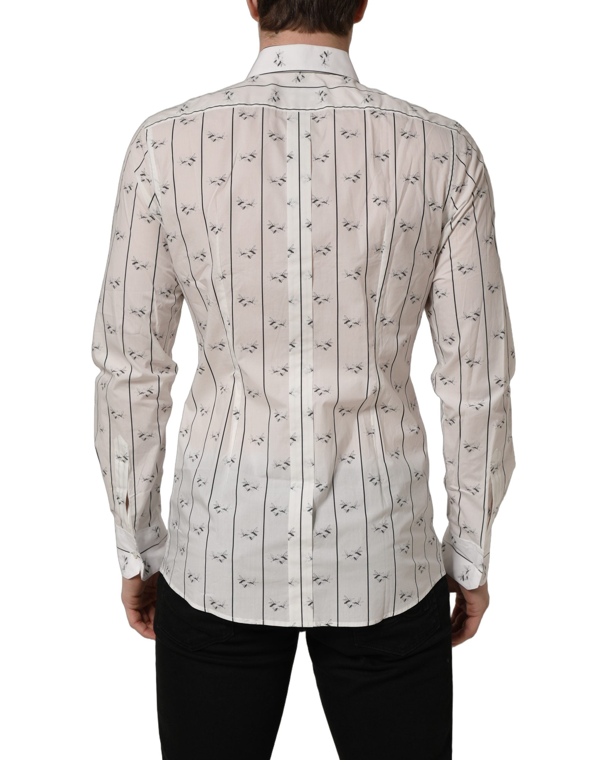 Chemise blanche Dolce & Gabbana en coton avec motif abeilles dorées, ajustée, élégante et confortable.