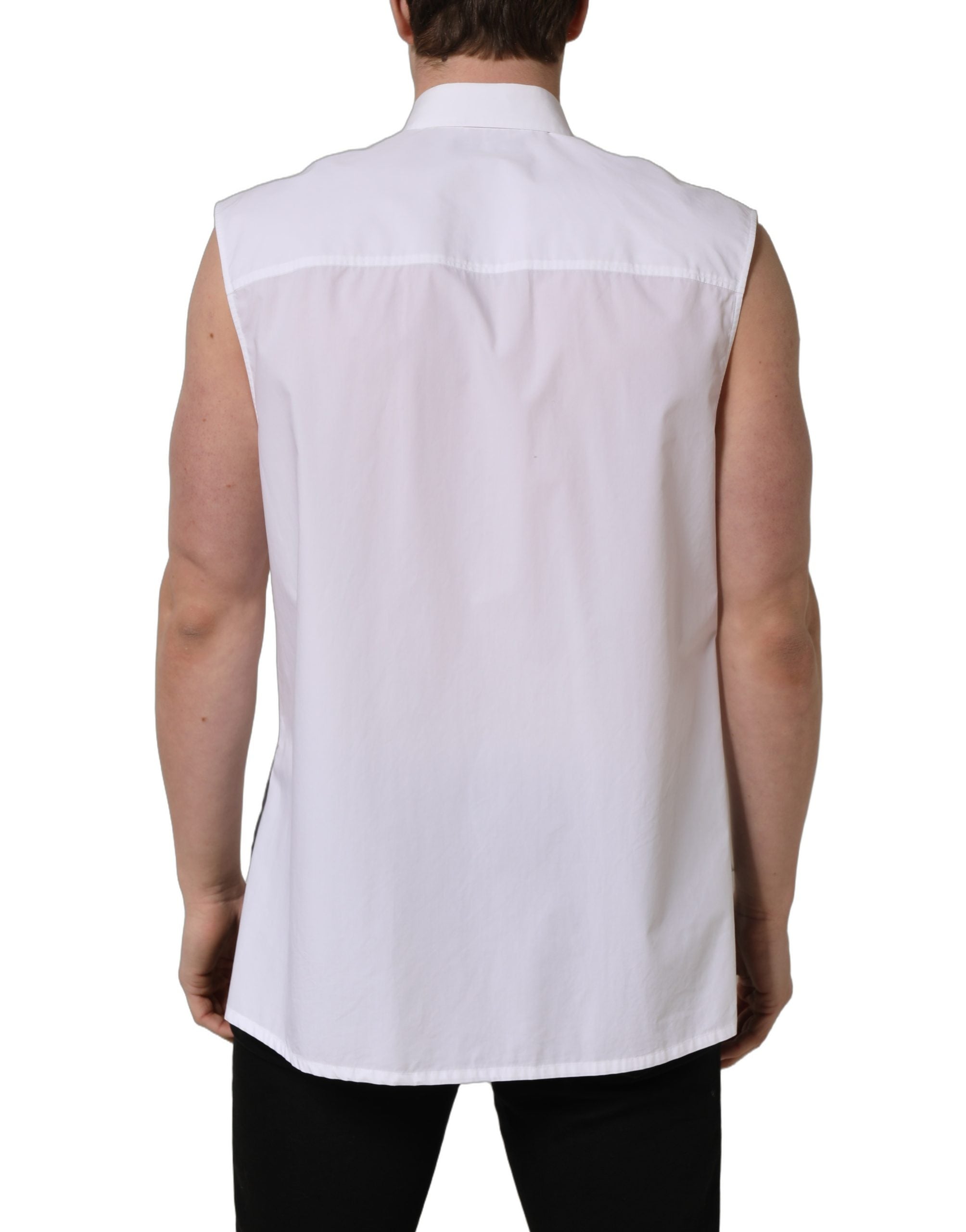 Chemise blanche sans manches Dolce & Gabbana en coton pour tenue formelle, détails élégants visibles sur l'image.