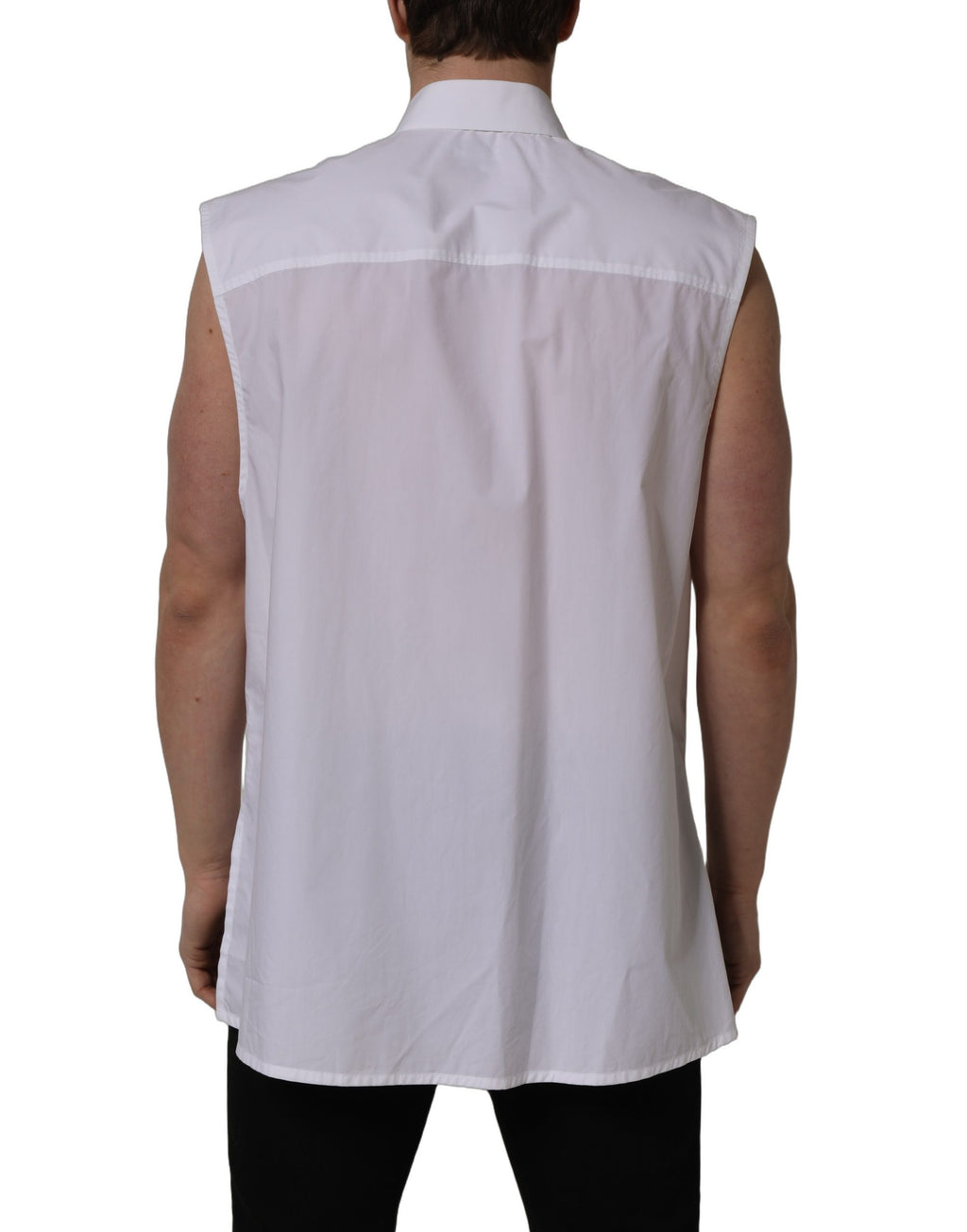 Chemise formelle blanche sans manches de coton Dolce & Gabbana, élégante et raffinée, avec col classique et boutons visibles.