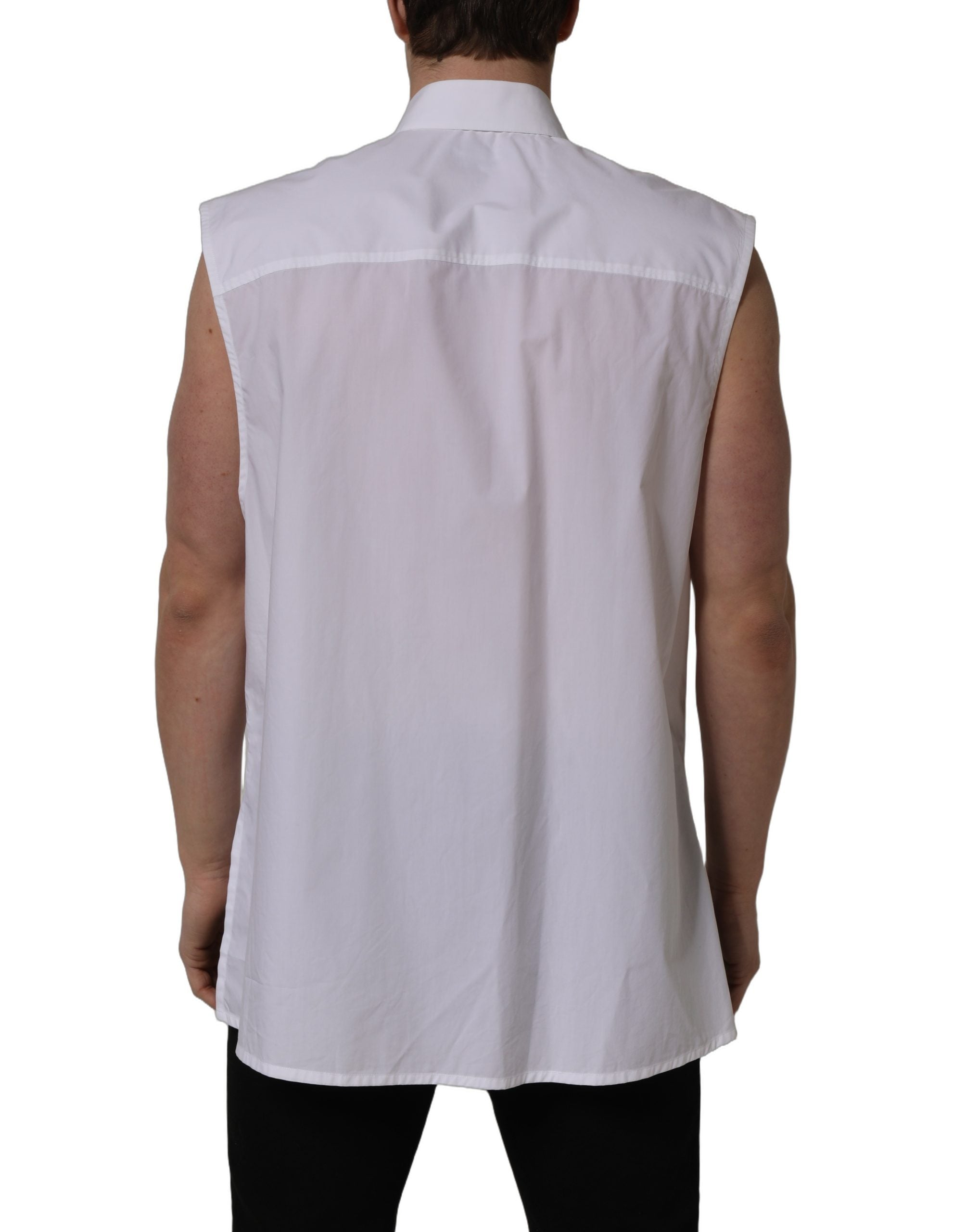 Chemise formelle blanche sans manches de coton Dolce & Gabbana, élégante et raffinée, avec col classique et boutons visibles.
