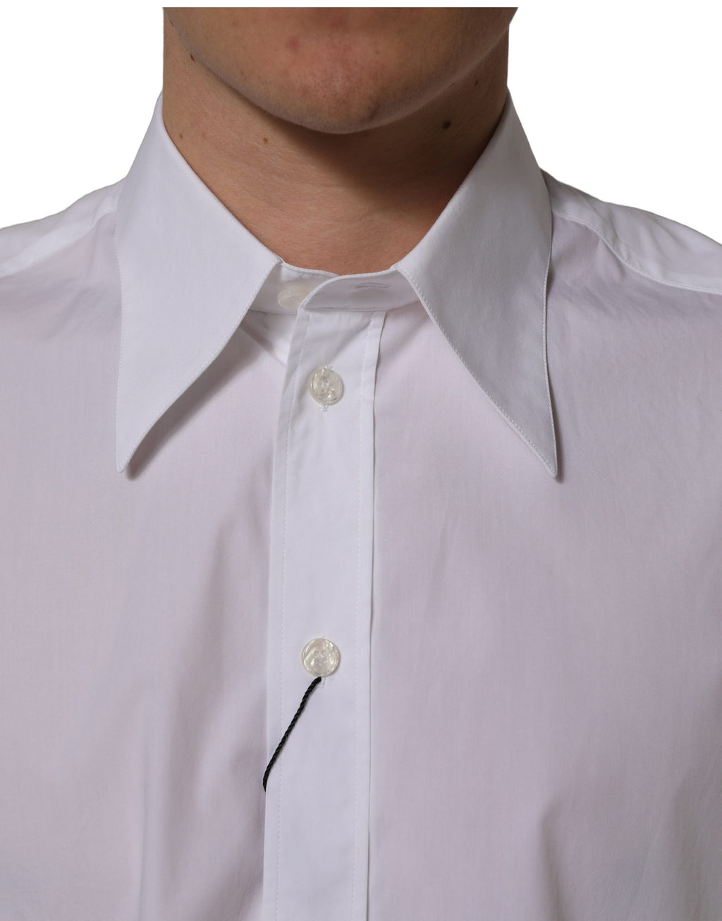 Chemise formelle blanche sans manches Dolce & Gabbana en coton, élégante et raffinée, adaptée pour des occasions spéciales.